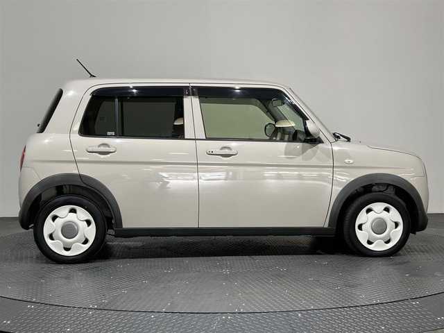 スズキ ラパン ＬＣ L 愛媛県 2022(令4)年 1.3万km フォーンベージュM ・ナビ（ワンセグＴＶ・ＢＴ・ＳＤ・ＣＤ・ＤＶＤ・ＦＭ・ＡＭ）/・前後ドラレコ　/・Ｄ席シートヒーター　/・衝突軽減ブレーキ　/・レーンキープアシスト　/・ＵＳＢ充電