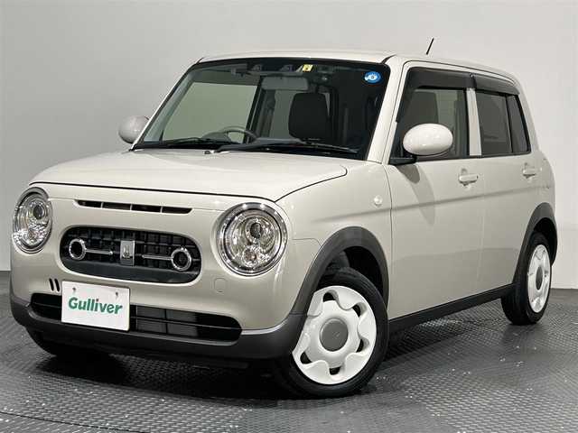 スズキ ラパン ＬＣ L 愛媛県 2022(令4)年 1.3万km フォーンベージュM ・ナビ（ワンセグＴＶ・ＢＴ・ＳＤ・ＣＤ・ＤＶＤ・ＦＭ・ＡＭ）/・前後ドラレコ　/・Ｄ席シートヒーター　/・衝突軽減ブレーキ　/・レーンキープアシスト　/・ＵＳＢ充電