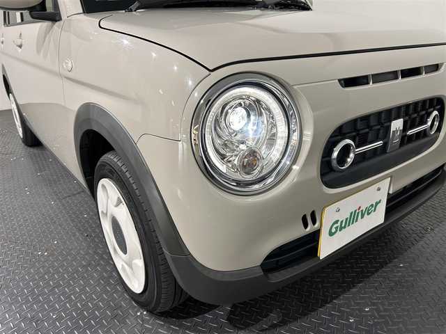 スズキ ラパン ＬＣ L 愛媛県 2022(令4)年 1.3万km フォーンベージュM ・ナビ（ワンセグＴＶ・ＢＴ・ＳＤ・ＣＤ・ＤＶＤ・ＦＭ・ＡＭ）/・前後ドラレコ　/・Ｄ席シートヒーター　/・衝突軽減ブレーキ　/・レーンキープアシスト　/・ＵＳＢ充電