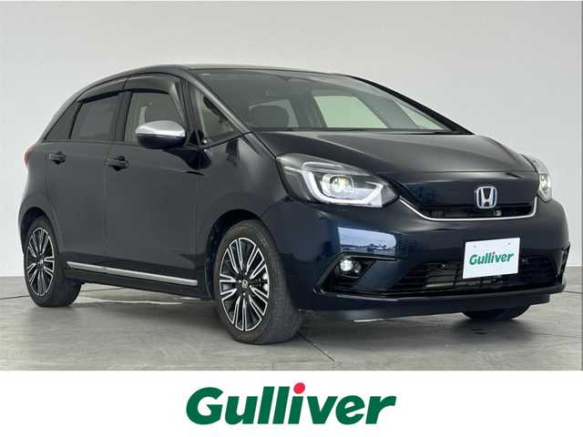 ホンダ フィット e:HEVリュクス 愛知県 2020(令2)年 3.3万km ミッドナイトブルービームM ホンダセンシング/純正ナビ/バックカメラ/レザーシート/Bluetooth/ACC/ETC/フルセグTV/テレビキャンセラー/シートヒーター/ステアリングヒート/ドアバイザー/置くだけ充電/ドアバイザー/後席USB端子入力/ドラレコ/純正フロアマット/純正AW/オートライト/レーダー