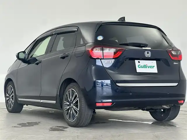 ホンダ フィット e:HEVリュクス 愛知県 2020(令2)年 3.3万km ミッドナイトブルービームM ホンダセンシング/純正ナビ/バックカメラ/レザーシート/Bluetooth/ACC/ETC/フルセグTV/テレビキャンセラー/シートヒーター/ステアリングヒート/ドアバイザー/置くだけ充電/ドアバイザー/後席USB端子入力/ドラレコ/純正フロアマット/純正AW/オートライト/レーダー