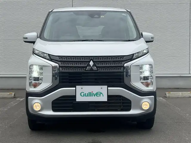 三菱 ｅＫクロス T 秋田県 2021(令3)年 8.7万km シルキーホワイト ４WD/LEDヘッドライト/純正ナビ/衝突軽減システム/フルセグ/全方位カメラ/純正アルミ/スマートキー/アイドリングストップ/コーナーセンサー/プッシュスタート/クルーズコントロール/ダウンヒルアシストコントロール/パーキングアシスト/ステアリングスイッチ/前席シートヒーター/ドライブレコーダー/ETC/純正フロアマット/純正ドアバイザー/オートライト/オートエアコン/パワーステアリング/パワーウィンドウ/横滑り防止/レベライザー/電動格納ウィンカーミラー/保証書/記録簿
