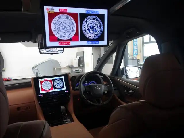 トヨタ ヴェルファイア ハイブリット Z プレミア 静岡県 2023(令5)年 0.3万km プラチナホワイトパールマイカ ワンオーナー／禁煙車/走行距離2232キロ/車検R8年8月29日/純正オプション/　・サンセットブラウンプレミアムナッパ革シート/　・13.2インチフリップダウンモニター/　・電子インナーミラー型ドライブレコーダー/　（前後方カメラ）/　・ユニバーサルステップ/トヨタセーフティセンス/BSM/トヨタチームメイト/　・アドバンストパーク/　・パーキングサポートブレーキ/　・アドバンストドライブ/　・リモート機能/左右独立ムーンルーフ/14インチディスプレイオーディオ/　ナビ／USB/HDMI/フルセグTV/　(TVキット付)／AppleCarPlay／/　Android audio/ETC2.0/おくだけ充電/ヘッドアップディスプレイ/快適温熱シート/前席パワーシート（運転席メモリー付）/2列目エグゼクティブパワーシート/　・パワーリクライニング/　・パワーオットマン/　・快適温熱シート/　・サイドテーブル/　・USB端子/5面スモーク施工/両側パワースライドドア/パワーバックドア/3眼LEDヘッドライト/プッシュスタート／スマートキー/純正フロアマット/保証書