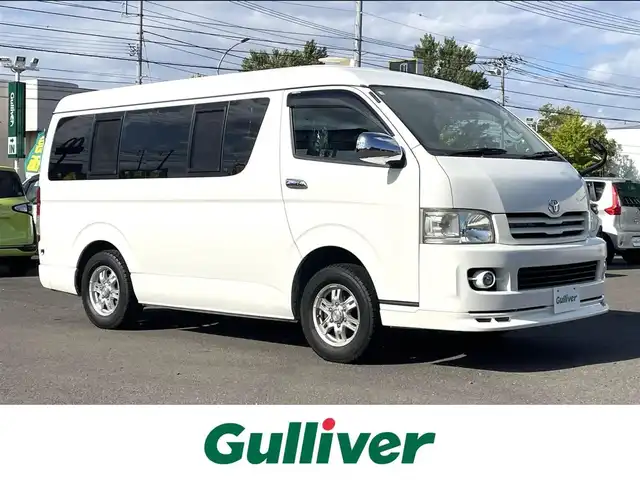 トヨタ ハイエース GL 道央・札幌 2010(平22)年 11.7万km ホワイト 4WD/キャンピング仕様/10人乗り/社外ナビ/フルセグTV/CD/DVD/MS/AM/FM/バックカメラ/パワースライドドア/リアテーブル/シートベッド/インバーター/サブバッテリー/FFヒーター/冷蔵庫/ドラレコ（前方タイプ）/ETC/社外15インチAW/ヒッチメンバー/室内フルカーテン/リモコンキー/スペアキー/社外エンジンスターター/保証書/取扱説明書
