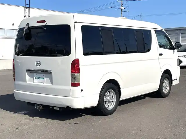 トヨタ ハイエース GL 道央・札幌 2010(平22)年 11.7万km ホワイト 4WD/キャンピング仕様/10人乗り/社外ナビ/フルセグTV/CD/DVD/MS/AM/FM/バックカメラ/パワースライドドア/リアテーブル/シートベッド/インバーター/サブバッテリー/FFヒーター/冷蔵庫/ドラレコ（前方タイプ）/ETC/社外15インチAW/ヒッチメンバー/室内フルカーテン/リモコンキー/スペアキー/社外エンジンスターター/保証書/取扱説明書