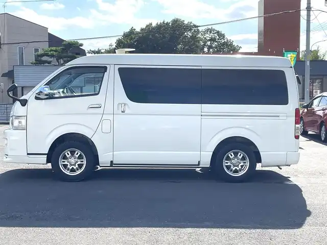 トヨタ ハイエース GL 道央・札幌 2010(平22)年 11.7万km ホワイト 4WD/キャンピング仕様/10人乗り/社外ナビ/フルセグTV/CD/DVD/MS/AM/FM/バックカメラ/パワースライドドア/リアテーブル/シートベッド/インバーター/サブバッテリー/FFヒーター/冷蔵庫/ドラレコ（前方タイプ）/ETC/社外15インチAW/ヒッチメンバー/室内フルカーテン/リモコンキー/スペアキー/社外エンジンスターター/保証書/取扱説明書