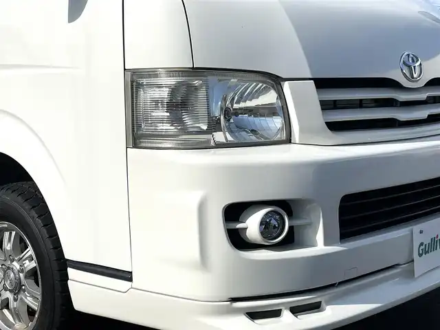 トヨタ ハイエース GL 道央・札幌 2010(平22)年 11.7万km ホワイト 4WD/キャンピング仕様/10人乗り/社外ナビ/フルセグTV/CD/DVD/MS/AM/FM/バックカメラ/パワースライドドア/リアテーブル/シートベッド/インバーター/サブバッテリー/FFヒーター/冷蔵庫/ドラレコ（前方タイプ）/ETC/社外15インチAW/ヒッチメンバー/室内フルカーテン/リモコンキー/スペアキー/社外エンジンスターター/保証書/取扱説明書