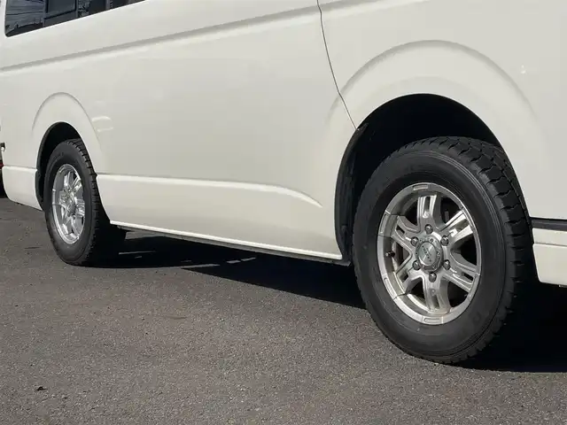 トヨタ ハイエース GL 道央・札幌 2010(平22)年 11.7万km ホワイト 4WD/キャンピング仕様/10人乗り/社外ナビ/フルセグTV/CD/DVD/MS/AM/FM/バックカメラ/パワースライドドア/リアテーブル/シートベッド/インバーター/サブバッテリー/FFヒーター/冷蔵庫/ドラレコ（前方タイプ）/ETC/社外15インチAW/ヒッチメンバー/室内フルカーテン/リモコンキー/スペアキー/社外エンジンスターター/保証書/取扱説明書