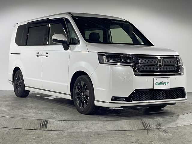 ホンダ ステップワゴン スパーダ 福岡県 2024(令6)年 1.2万km プラチナホワイトパール 社外10インチディスプレイオーディオ/両側パワースライドドア/レーダークルーズコントロール/パワーバックドア/ホンダセンシング/LEDヘッドライト/オットマン/ブランドスポットモニター/パトルシフト/シートヒーター（D/N）/オートライト/純正16インチアルミホイール/純正フロアマット