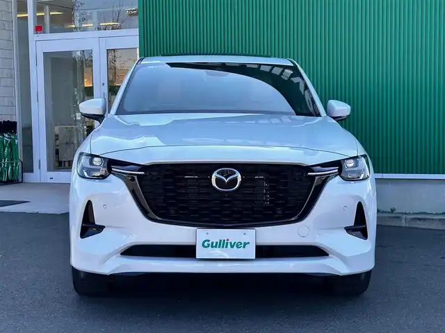マツダ ＣＸ－６０ XD HV プレミアムスポーツ 宮城県 2023(令5)年 1.8万km ロジウムホワイトプレミアムメタリック BOSEサウンドシステム/パノラマサンルーフ/スマートブレーキサポート/誤発進抑制制御/車線逸脱警報システム/降車支援機能付ブラインドスポットモニタリング/レーンキープアシストシステム/緊急時車線維持支援システム/接近車両検知（前側方/後側方）/レーダークルーズコントロール/クルージングトラフィックサポート/コーナーセンサー/ドライバー異常時対応システム/ヘッドアップディスプレイ/シースルービュー機能付360度ビューモニター/12.3インチセンターディスプレイ/・Bluetooth/・AppleCarPlay/AndroidAuto/・フルセグTV/・USB/HDMI/ワイヤレス充電/ハンズフリーパワーバックドア/ハーフレザーシート/シートヒーター／ベンチレーション/パワーシート（運転席メモリー機能付）/ステアリングヒーター/電動パーキングブレーキ/ブレーキホールド/アダプティブLEDヘッドランプ/スマートキー＆プッシュスタート/電動格納ミラー/純正20インチAW/純正ラバーマット/W/サイド/カーテンエアバッグ