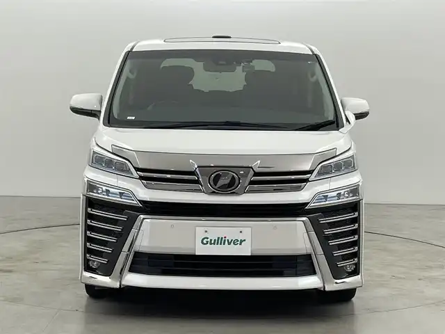 トヨタ ヴェルファイア Z Gエディション 福岡県 2018(平30)年 5.1万km ホワイトパールクリスタルシャイン Ｗサンルーフ　/後席モニター　/純正１０型ナビ／バックカメラ　/デジタルインナーミラー　/ビルトインETC　/前方ドライブレコーダー　/トヨタセーフティセンス　/レーダークルーズコントロール　/コーナーセンサー　/衝突軽減ブレーキ　/レーンキープ　/アクセル踏み間違い防止　/両側電動スライドドア　/パワーバックドア　/シートメモリー付きパワーシート　/シートベンチレーション／ヒーター　/オートマチックハイビーム　/3眼ＬＥＤヘッドライト　/純正１８インチアルミホイール
