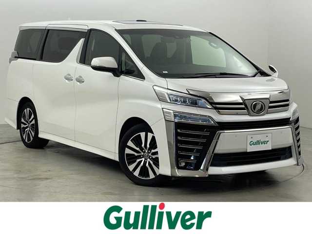 トヨタ ヴェルファイア Z Gエディション 福岡県 2018(平30)年 5.1万km ホワイトパールクリスタルシャイン Ｗサンルーフ　/後席モニター　/純正１０型ナビ／バックカメラ　/デジタルインナーミラー　/ビルトインETC　/前方ドライブレコーダー　/トヨタセーフティセンス　/レーダークルーズコントロール　/コーナーセンサー　/衝突軽減ブレーキ　/レーンキープ　/アクセル踏み間違い防止　/両側電動スライドドア　/パワーバックドア　/シートメモリー付きパワーシート　/シートベンチレーション／ヒーター　/オートマチックハイビーム　/3眼ＬＥＤヘッドライト　/純正１８インチアルミホイール