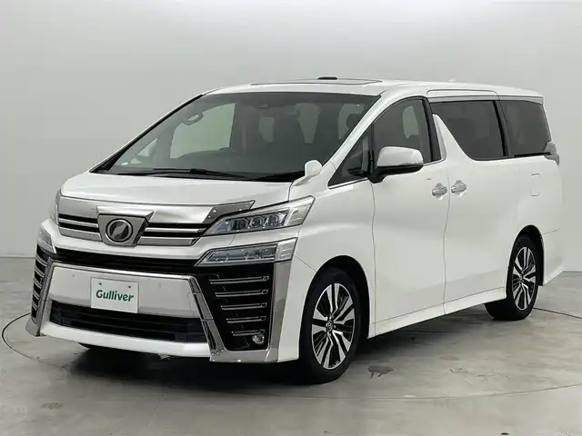 トヨタ ヴェルファイア Z Gエディション 福岡県 2018(平30)年 5.1万km ホワイトパールクリスタルシャイン Ｗサンルーフ　/後席モニター　/純正１０型ナビ／バックカメラ　/デジタルインナーミラー　/ビルトインETC　/前方ドライブレコーダー　/トヨタセーフティセンス　/レーダークルーズコントロール　/コーナーセンサー　/衝突軽減ブレーキ　/レーンキープ　/アクセル踏み間違い防止　/両側電動スライドドア　/パワーバックドア　/シートメモリー付きパワーシート　/シートベンチレーション／ヒーター　/オートマチックハイビーム　/3眼ＬＥＤヘッドライト　/純正１８インチアルミホイール