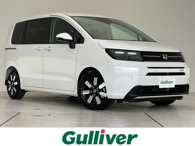 ホンダ フリード ハイブリット e:HEV AIR EX 愛知県 2025(令7)年 0.1千km プラチナホワイトパール 登録済未使用車/純正9型ディスプレイオーディオナビ/両側パワースライドドア/レーダークルーズコントロール/シートヒーター/バックカメラ/コーナーセンサー/純正アルミホイール/ブラインドスポットモニター/LEDヘッドライト/オートマチックハイビーム/衝突軽減システム/フルセグ/Bluetooth/ステアリングスイッチ/スマートキー/プッシュスタート