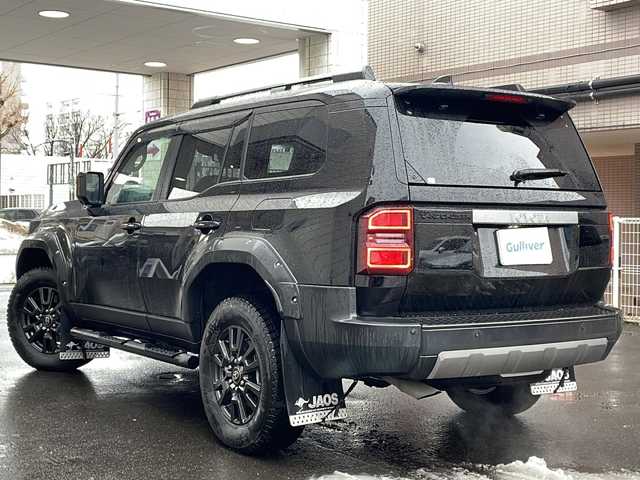 トヨタ ランドクルーザー ２５０ VX 道央・札幌 2024(令6)年 1.5万km ブラック ワンオーナー/丸目ヘッドランプ/12.3インチ純正ディスプレイオーディオ/　(コネクティッドナビ対応/フルセグTV/AM/FM/BT)/Apple CarPlay/Android Auto/全周囲カメラ/JBLツィーカー/JAOSカスタムパーツ/　・フロントバンパーガード/　・スキッドプレートIII/　・フェンダーガーニッシュ　type-X/　・サイドステップ　ブラック/　・マッドガードIIIセット　ブラック/Toyota Safety Sense/前後純正ドライブレコーダー/ETC2.0/前席シートヒーター/シートベンチレーション/ステアリングヒーター/パワーヒータースイッチ/ヘッドランプクリーナー/パワーバックドア/排出ガス浄化スイッチ/セカンドスタートモード/DAC-CRAWLスイッチ/センターでフロックスイッチ/トランスファースイッチ/置くだけ充電/デジタルインナーミラー/スペアキー/保証書