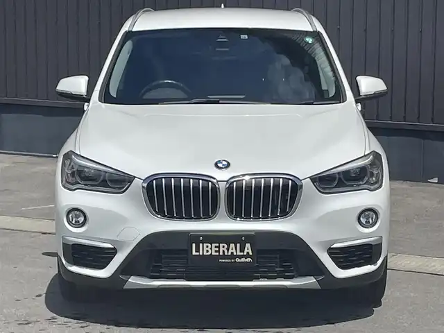 ＢＭＷ Ｘ１ xDrive 18d xライン 青森県 2018(平30)年 4.7万km ミネラルホワイト /4WD/ディーゼル・ターボ/メーカーオプション/ハイラインパッケージ/-パーフォレーテッドダコタレザーシート/-フロントシートヒーティング/-ファインウッドオークグレインマットインテリアトリム/コンフォートパッケージ/-オートマチックテールゲートオペレーション/-スライディングリヤシート/-電動フロントシート運転席メモリー機能付/主要装備/インテリジェントセーフティ/純正HDDナビ/　(DVD/Bt/USB)/バックカメラ/ミラー一体型ETC/スマートキー/前後バンパーソナー/ダウンヒルアシスト/純正18インチアルミホイール/LEDオートライト/シルバールーフレール/ウインカーミラー /前後フォグランプ/革巻きステア/ノブ/オーディオ/ステアスイッチ/オートワイパー/電格調整ミラー/レーンキーピングアシスト/パーキングアシスト/ヒルクライムアシスト/横滑り防止機能/W/サイド/カーテンエアバッグ/ABS/スマートキー/保証書/取説