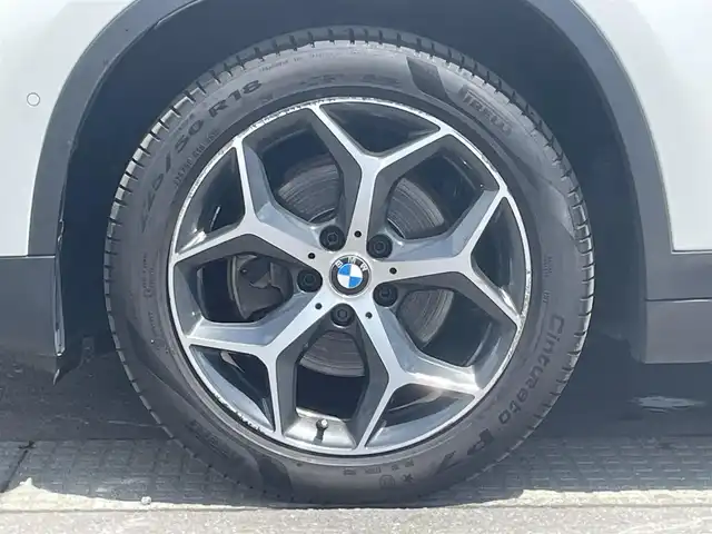 ＢＭＷ Ｘ１ xDrive 18d xライン 青森県 2018(平30)年 4.7万km ミネラルホワイト /4WD/ディーゼル・ターボ/メーカーオプション/ハイラインパッケージ/-パーフォレーテッドダコタレザーシート/-フロントシートヒーティング/-ファインウッドオークグレインマットインテリアトリム/コンフォートパッケージ/-オートマチックテールゲートオペレーション/-スライディングリヤシート/-電動フロントシート運転席メモリー機能付/主要装備/インテリジェントセーフティ/純正HDDナビ/　(DVD/Bt/USB)/バックカメラ/ミラー一体型ETC/スマートキー/前後バンパーソナー/ダウンヒルアシスト/純正18インチアルミホイール/LEDオートライト/シルバールーフレール/ウインカーミラー /前後フォグランプ/革巻きステア/ノブ/オーディオ/ステアスイッチ/オートワイパー/電格調整ミラー/レーンキーピングアシスト/パーキングアシスト/ヒルクライムアシスト/横滑り防止機能/W/サイド/カーテンエアバッグ/ABS/スマートキー/保証書/取説