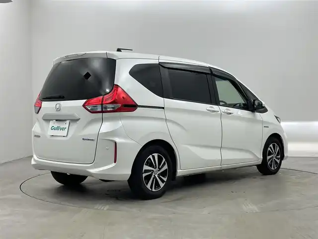 ホンダ フリード ハイブリット EX 埼玉県 2017(平29)年 6.3万km ホワイトオーキッドパール 純正ナビ/・FM/・AM/・フルセグTV/・CD/・DVD/・MusicRack/・SD/主要装備/・バックカメラ/・追従機能付クルーズコントロール/・ＥＴＣ/・ドライブレコーダー/・サイドカーテンエアバッグ/・衝突被害軽減システム/(ホンダセンシング)/・両側パワースライドドア/・コーナーセンサー/・１００Ｖ電源/・横滑り防止装置/・LEDヘッドライト/・レーンキープアシスト/・シートカバー/・純正15AW
