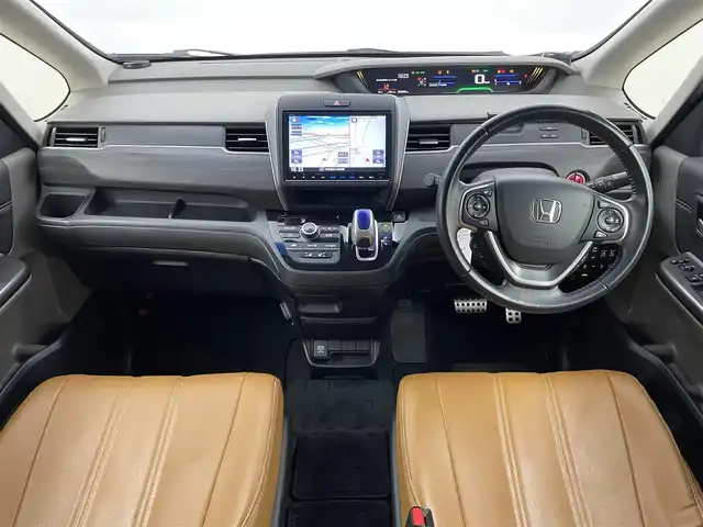 ホンダ フリード ハイブリット EX 埼玉県 2017(平29)年 6.3万km ホワイトオーキッドパール 純正ナビ/・FM/・AM/・フルセグTV/・CD/・DVD/・MusicRack/・SD/主要装備/・バックカメラ/・追従機能付クルーズコントロール/・ＥＴＣ/・ドライブレコーダー/・サイドカーテンエアバッグ/・衝突被害軽減システム/(ホンダセンシング)/・両側パワースライドドア/・コーナーセンサー/・１００Ｖ電源/・横滑り防止装置/・LEDヘッドライト/・レーンキープアシスト/・シートカバー/・純正15AW