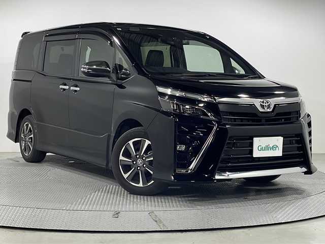 トヨタ ヴォクシー ZS 煌Ⅲ 広島県 2021(令3)年 2.5万km ブラック 純正9型ナビ/純正フリップダウンモニター/両側パワースライドドア/バックカメラ/クリアランスソナー/セーフティセンス/・プリクラッシュセーフティ/・レーンディパーチャーアラート/・オートマチックハイビーム/クルーズコントロール/LEDヘッドランプ/純正16インチAW/ビルトインETC/ドライブレコーダー