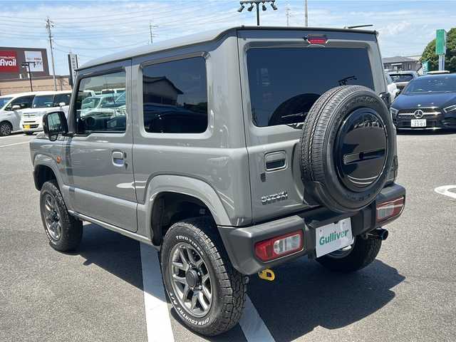 スズキ ジムニー XC 岐阜県 2023(令5)年 2.5万km ミディアムグレー 登録時24474km/ディスプレイオーディオ/クルーズコントロール/スマートキー/プッシュスタート/バックカメラ/４WD/ETC/Bluetooth/LEDライト/アイドリングストップ/純正アルミホイール/シートヒーター