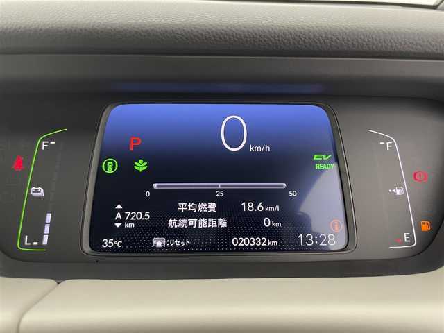ホンダ フィット e:HEVホーム 富山県 2023(令5)年 2.1万km クリスタルブラックパール 純正ナビ（AM/FM/BT/USB/フルセグ）/全方位カメラ/ドライブレコーダー/ETC/ブラインドスポットモニター/OPグレー半革シート/シートヒーター/衝突被害軽減システム/レーダークルーズコントロール/レーンキープアシスト/コーナーセンサー/横滑り防止装置/アイドリングストップ/オートLEDライト/フォグライト/純正フロアマット/オートホールド付電子パーキング/革巻きステアリング/ステアリングスイッチ/スマートキー