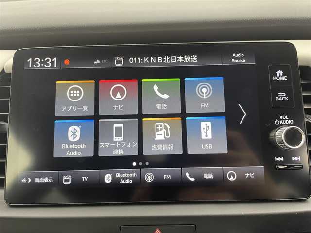 ホンダ フィット e:HEVホーム 富山県 2023(令5)年 2.1万km クリスタルブラックパール 純正ナビ（AM/FM/BT/USB/フルセグ）/全方位カメラ/ドライブレコーダー/ETC/ブラインドスポットモニター/OPグレー半革シート/シートヒーター/衝突被害軽減システム/レーダークルーズコントロール/レーンキープアシスト/コーナーセンサー/横滑り防止装置/アイドリングストップ/オートLEDライト/フォグライト/純正フロアマット/オートホールド付電子パーキング/革巻きステアリング/ステアリングスイッチ/スマートキー