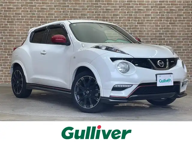 日産 ジューク ニスモ 岩手県 2014(平26)年 10.9万km ブリリアントホワイトパール ４WD/ターボ/MTモード付きAT/専用エクステリア/NISMO専用シート/専用本革・アルカンターラステアリング/専用18インチアルミホイール/アルミペダル/ビークルダイナミクスコントロール/オートエアコン/純正ナビ/（CD/DVD/フルセグ/USB/Bluetooth）/ETC/ドライブレコーダー/オートライト/HIDヘッドライト/純正フロアマット