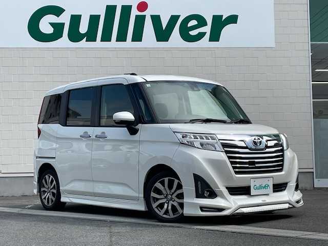 トヨタ ルーミー カスタムG－T 静岡県 2018(平30)年 6.7万km パールホワイトⅢ ●社外ナビ/(フルセグ/CD/DVD/Bluetooth)/(AVIC-RW901)/●バックカメラ/●クルーズコントロール/●衝突被害軽減システム/●後方コーナーセンサー/●LEDライト＆フォグランプ/●オートライト/●革巻きステアリング/●ステアリングスイッチ/●ETC/●両側パワースライドドア/●スマートキー/●プッシュスタート/●スペアキー×1/●純正フロアマット/●純正15インチアルミホイール/●ダブルSRS＋ABS/●取扱説明書