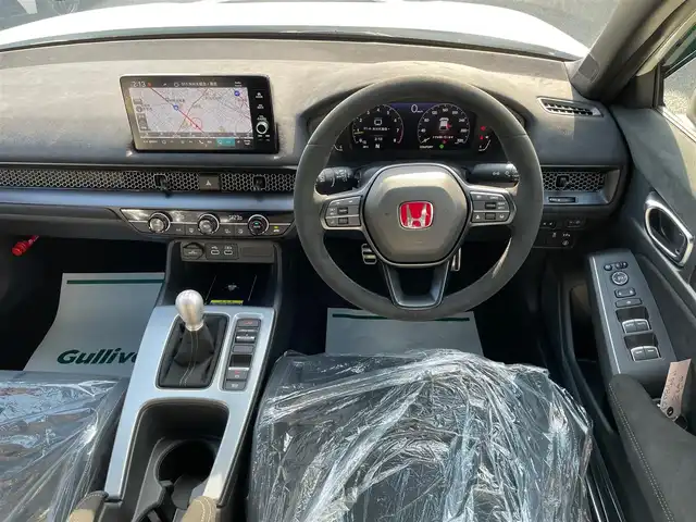 ホンダ シビック タイプR レーシングブラックPKG 神奈川県 2025(令7)年 0.1千km チャンピオンシップホワイト ワンオーナー/純正メモリーナビ・地デジTV/バックモニター/ビルトインETC2.0/純正USB/BT再生/ワイヤレス充電/ホンダセンシング/レーダークルーズコントロール/PCS/LKA/BSM/標識検知/コーナーセンサー/純正19インチAW/ブレンボブレーキ/LEDライト/プッシュスタート/スマートキー×2/純正バイザー/保証書・取説あり