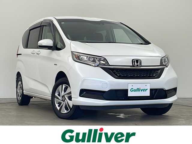ホンダ フリード＋ ハイブリット G ホンダセンシング 秋田県 2020(令2)年 3.3万km プラチナホワイトパール 4WD/社外メモリナビ　/フルセグTV/CD/DVD/HDMI/Bluetooth/両側パワースライドドア　/衝突被害軽減防止ブレーキ　/レーダークルーズコントロール　　/レーンキープアシスト　/バックカメラ　/ワイパーデアイサー　/前席シートヒーター　/ＥＴＣ　/LEDヘッドライト/ドアバイザー/後席サンシェード/純正アルミホイールキャップ/スペアキー/プッシュスタート