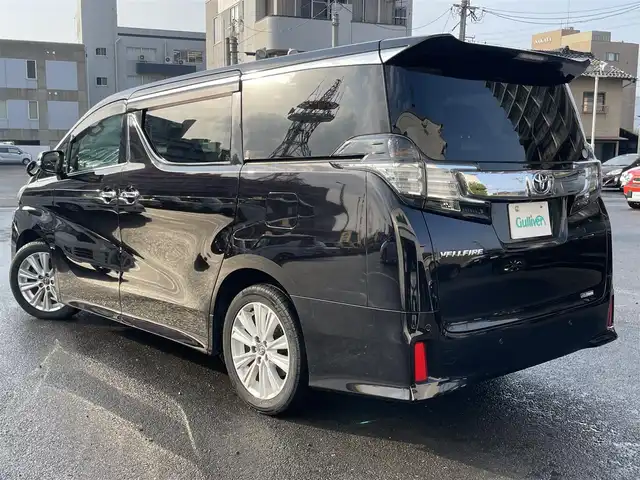 トヨタ ヴェルファイア Z Aエディション 島根県 2017(平29)年 6.8万km バーニングブラッククリスタルシャインガラスフレーク 純正９インチＳＤナビ　/純正12.1インチフリップダウンモニター　/フルセグＴＶ　/ＤＶＤ再生　/Ｂｌｕｅｔｏｏｔｈ接続　/バックカメラ　/両側パワースライドドア　/前方ドライブレコーダー　/ビルトインＥＴＣ２．０　/クルーズコントロール　/前後コーナーセンサー　/電動パーキングブレーキ・オートホールド/スマートキー・プッシュスタート　/純正LEDライト/純正１８インチアルミホイール/純正フロアマット/取扱説明書（本体＋ナビ）/スペアキー1本