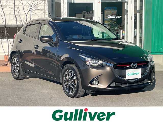 マツダ デミオ XD ツーリング 青森県 2015(平27)年 11.1万km チタニウムフラッシュマイカ 4WD/純正SDナビ・フルセグTV/CD・DVD・Bluetooth・USB/ヘッドアップディスプレイ/スマートシティブレーキサポート/クルーズコントロール/パドルシフト/純正エンジンスターター/ETC/LEDヘッドライト/フォグランプ/純正16インチアルミ/スマートキー/プッシュスタート/スペアキー