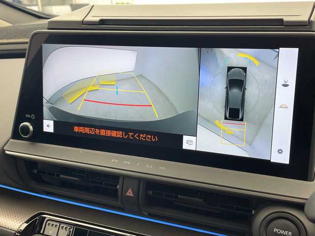 トヨタ プリウス Z 千葉県 2023(令5)年 1.8万km アティチュードブラックマイカ モデリスタエアロ（F/S/R）/トヨタセーフティセンス/プリクラッシュセーフティ/レーントレーシングアシスト/レーンディパーチャーアラート/ロードサインアシスト/レーダークルーズコントロール/オートマチックハイビーム/先行車発進アラーム/プロアクティブドライビングアシスト/レーンチェンジアシスト/緊急時操舵支援/フロントクロストラフィックアラート/ブラインドスポットモニター/リアクロストラフィックアラート/12.3型純正ナビ/　Bluetooth/AppleCarplay/AndroidAuto/フルセグTV/パノラミックビューモニター/ビルトインETC2.0/パノラマルーフ/パワーバックドア/レザーシート/前席シートヒーター/前席エアーシート/運転席パワーシート/ステアリングヒーター/ワイヤレス充電/AC100V電源/オートライト/LEDヘッドライト