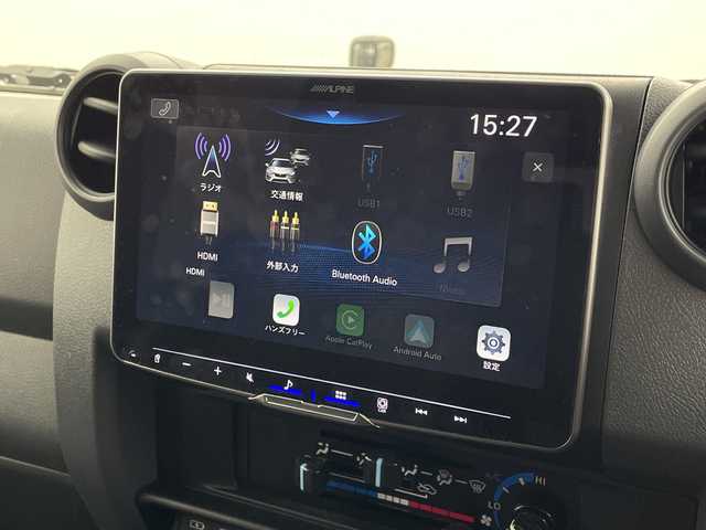 トヨタ ランドクルーザー AX 群馬県 2024(令6)年 1.3万km アティチュードブラックマイカ アルパインディスプレイオーディオ　ＪＡＯＳフロントバンパーガーニッシュ バックカメラ　パンテーラセキュリティー　ハーフレザーシート　LEDヘッドライト　クルーズコントロール　衝突被害軽減ブレーキ　禁煙