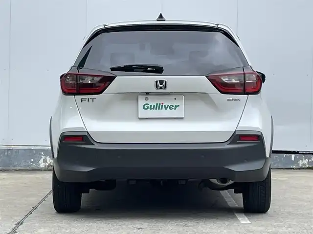 ホンダ フィット e:HEVクロスター 青森県 2022(令4)年 4.2万km プラチナホワイトパール ●ワンオーナー/●純正ＳＤナビフルセグ/（ＶＸＭ－２１５ＶＦＥＩ）/●バックモニター/●ＬＥＤヘッドライト/●純正エンスタ/●純正１６ＡＷ夏/●純正１６ＡＷ冬/●Ｈｏｎｄａ　ＳＥＮＳＩＮＧ/●カーテンエアバック/●スマートキー/●スペアキー/●新車時保証書/●取扱い説明書