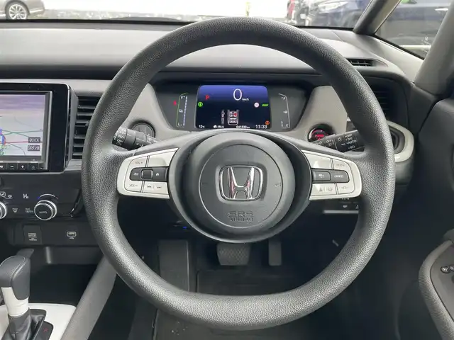 ホンダ フィット e:HEVクロスター 青森県 2022(令4)年 4.2万km プラチナホワイトパール ●ワンオーナー/●純正ＳＤナビフルセグ/（ＶＸＭ－２１５ＶＦＥＩ）/●バックモニター/●ＬＥＤヘッドライト/●純正エンスタ/●純正１６ＡＷ夏/●純正１６ＡＷ冬/●Ｈｏｎｄａ　ＳＥＮＳＩＮＧ/●カーテンエアバック/●スマートキー/●スペアキー/●新車時保証書/●取扱い説明書