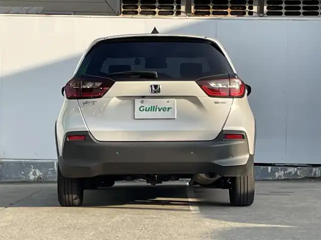ホンダ フィット e:HEVクロスター 青森県 2022(令4)年 4.2万km プラチナホワイトパール ●ワンオーナー/●純正ＳＤナビフルセグ/（ＶＸＭ－２１５ＶＦＥＩ）/●バックモニター/●ＬＥＤヘッドライト/●純正エンスタ/●純正１６ＡＷ夏/●純正１６ＡＷ冬/●Ｈｏｎｄａ　ＳＥＮＳＩＮＧ/●カーテンエアバック/●スマートキー/●スペアキー/●新車時保証書/●取扱い説明書