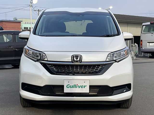 ホンダ フリード G 道北・旭川 2024(令6)年 0.7万km プラチナホワイトパール ・4WD/・社外ナビ/BT/USB/ラジオ/・バックカメラ/・両側パワースライドドア/・前席シートヒーター/・キャプテンシート/・寒冷地仕様/・ミラーヒーター/・LEDヘッドライト/・アイドリングストップ/・ホンダセンシング/・衝突軽減ブレーキ/・前後誤発進抑制機能/・歩行者事故低減ステアリング/・レーダークルーズコントロール/・車線維持支援システム/・レーンキープアシスト/・先行車発進お知らせ機能/・標識認識機能/・保証書
