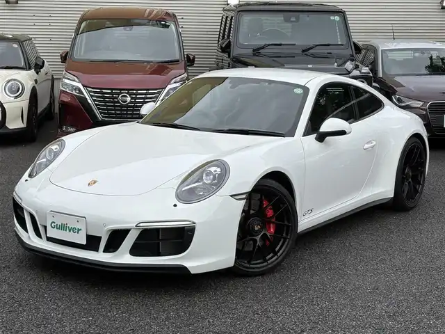 ポルシェ ９１１ カレラ GTS 東京都 2019(令1)年 2万km ピュアホワイト スポーツクロノパッケージ（ステアリングスイッチ付）/PASM（ポルシェアクティブ・サスペンション・マネジメント）/スポーツエキゾースト/保証書・取説・キーレスキー×２/R2.3.4.5.6年ディーラー記録簿/アルカンターラーステアリング・パドルシフト/アイドリングストップ/クルーズコントロール/電動リアスポイラー/GTS専用黒ハーフレザーシート/前席一部パワーシート・シートヒーター/純正HDDナビ/DVD/CD/SD/BT/USB/バックカメラ・バックセンサー/ビルトインETC（DSRC）/外前後ドラレコ/外レーダー（Z291csd）/純正２０インチブラックアルミ（センターロック式）/ポルシェダイナミックHIDライト（バイキセノン）・オートライト・リアフォグ・ヘッドライトクリーナー/電動格納ミラー/AUHOHOLD