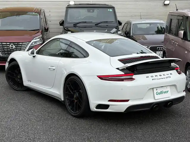 ポルシェ ９１１ カレラ GTS 東京都 2019(令1)年 2万km ピュアホワイト スポーツクロノパッケージ（ステアリングスイッチ付）/PASM（ポルシェアクティブ・サスペンション・マネジメント）/スポーツエキゾースト/保証書・取説・キーレスキー×２/R2.3.4.5.6年ディーラー記録簿/アルカンターラーステアリング・パドルシフト/アイドリングストップ/クルーズコントロール/電動リアスポイラー/GTS専用黒ハーフレザーシート/前席一部パワーシート・シートヒーター/純正HDDナビ/DVD/CD/SD/BT/USB/バックカメラ・バックセンサー/ビルトインETC（DSRC）/外前後ドラレコ/外レーダー（Z291csd）/純正２０インチブラックアルミ（センターロック式）/ポルシェダイナミックHIDライト（バイキセノン）・オートライト・リアフォグ・ヘッドライトクリーナー/電動格納ミラー/AUHOHOLD