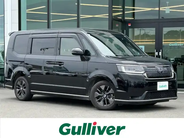 ホンダ ステップワゴン スパーダ eHEV 東京都 2023(令5)年 2.9万km クリスタルブラックパール 純正ナビ/バックカメラ/ビルトインETC/両側パワースライドドア/パワーバックドア/シートヒーター/レザーシート/ホンダセンシング/衝突軽減システム/レーンキープアシスト/ブラインドスポットモニター/レーダークルーズコントロール/コーナーセンサー/LEDヘッドライト