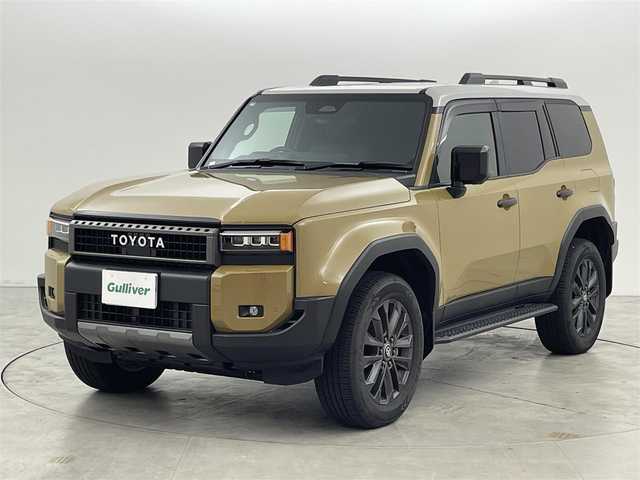トヨタ ランドクルーザー ２５０ ZX 福岡県 2025(令7)年 0.4万km ベージュⅡ ワンオーナー　/ムーンルーフ/メーカーＤＡナビ/フルセグTV　/全方位カメラ　/ＪＢＬサウンド　/デジタルインナーミラー　/ワイヤレス充電　/ビルトインＥＴＣ２．０　/トヨタセーフティセンス　/レーダークルーズコントロール　/コーナーセンサー　/衝突軽減ブレーキ　/レーダーキープ　/ブラインドスポットモニター　/アクセル踏み間違い防止　/ヒルディセントコントロール　/ヘッドアップディスプレイ　/パドルシフト　/パワーシート　/シートヒーター/ベンチレーション　/パワーバックドア　/ルーフレール　/純正２０インチアルミホイール　/ＬＥＤヘッドライト