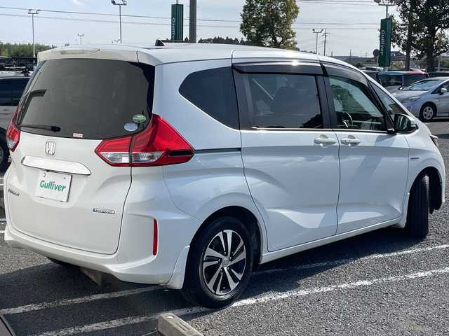 ホンダ フリード ハイブリット EX 千葉県 2019(令1)年 5.1万km ホワイトオーキッドパール 9型ナビVXM-197VFNi フリップダウンモニター バックカメラ 両側電動スライドドア BT ETC レーダークルーズ シートヒーター スマートキー LEDライト オートライト 15インチAW