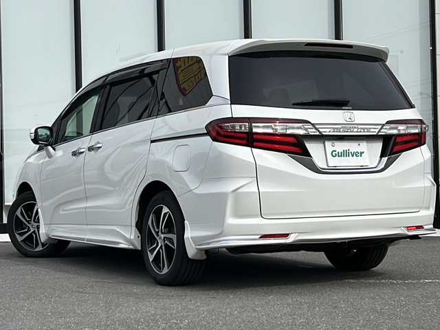 ホンダ オデッセイ アブソルート EX ADV 山形県 2015(平27)年 4.5万km ホワイトオーキッドパール 4WD/衝突被害軽減システム/BSM/純正ナビ/（Bluetooth/CD/DVD/フルセグ)/全方位カメラ/フリップダウンモニター/両側パワースライドドア/レザーシート/レーダークルーズコントロール/D席パワーシート/ステアリングスイッチ/ビルトインETC/電動格納ミラー/純正スタッドレス(6mm)/スマートキー