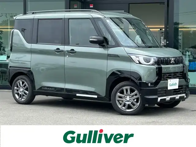 三菱 デリカミニ T プレミアム 東京都 2025(令7)年 0.1万km未満 緑Ｍ 届出済未使用車/純正ディスプレイオーディオ/全方位カメラ/三菱e-Assist/・衝突被害軽減ブレーキシステム/・踏み間違い衝突防止アシスト/・オートマチックハイビーム/・標識認識システム/・先行車発進通知/・車線逸脱警報システム/・車線逸脱防止支援機能/・ふらつき警報/・前方衝突予測警報/マイパイロット/・レーダークルーズコントロール/・車線維持支援機能/コーナーセンサー/両側パワースライドドア/シートヒーター/ルーフレール/デジタルインナーミラー/ステアリングヒーター/LEDヘッドライト/パドルシフト/純正アルミホイール