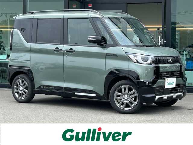 三菱 デリカミニ T プレミアム 東京都 2025(令7)年 0.1千km 緑Ｍ 届出済未使用車/純正ディスプレイオーディオ/全方位カメラ/三菱e-Assist/・衝突被害軽減ブレーキシステム/・踏み間違い衝突防止アシスト/・オートマチックハイビーム/・標識認識システム/・先行車発進通知/・車線逸脱警報システム/・車線逸脱防止支援機能/・ふらつき警報/・前方衝突予測警報/マイパイロット/・レーダークルーズコントロール/・車線維持支援機能/コーナーセンサー/両側パワースライドドア/シートヒーター/ルーフレール/デジタルインナーミラー/ステアリングヒーター/LEDヘッドライト/パドルシフト/純正アルミホイール/シャモニーパッケージ