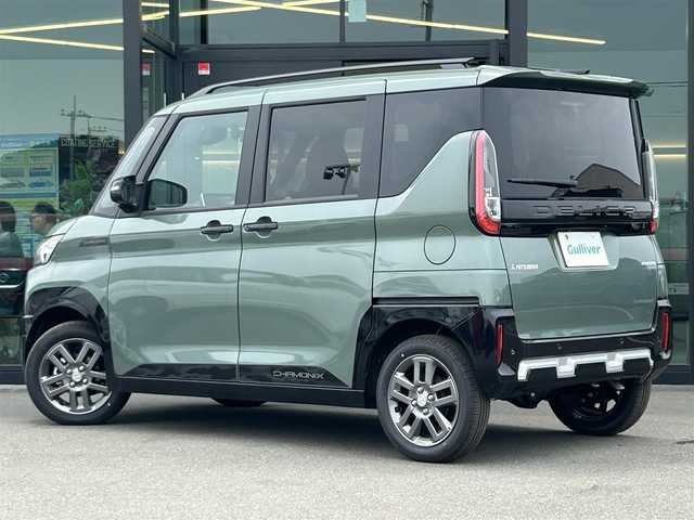 三菱 デリカミニ T プレミアム 東京都 2025(令7)年 0.1千km 緑Ｍ 届出済未使用車/純正ディスプレイオーディオ/全方位カメラ/三菱e-Assist/・衝突被害軽減ブレーキシステム/・踏み間違い衝突防止アシスト/・オートマチックハイビーム/・標識認識システム/・先行車発進通知/・車線逸脱警報システム/・車線逸脱防止支援機能/・ふらつき警報/・前方衝突予測警報/マイパイロット/・レーダークルーズコントロール/・車線維持支援機能/コーナーセンサー/両側パワースライドドア/シートヒーター/ルーフレール/デジタルインナーミラー/ステアリングヒーター/LEDヘッドライト/パドルシフト/純正アルミホイール/シャモニーパッケージ