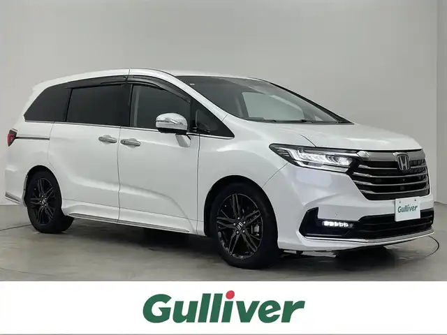 ホンダ オデッセイ ハイブリッド e:HEVアブソルート EX 埼玉県 2021(令3)年 6.1万km プラチナホワイトパール 純正９インチナビ　マルチビューモニター　デジタルミラー　パワーバックドア　アダプティブクルーズコントロール　ＢＳＭ　両側パワースライドドア　シートヒーター　ホンダセンシング　前後ドラレコ　ＬＥＤライト