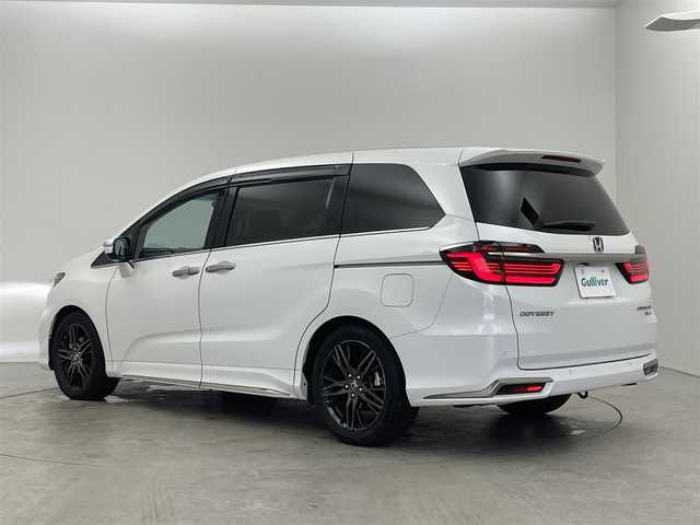 ホンダ オデッセイ ハイブリッド e:HEVアブソルート EX 埼玉県 2021(令3)年 6.1万km プラチナホワイトパール 純正９インチナビ　マルチビューモニター　デジタルミラー　パワーバックドア　アダプティブクルーズコントロール　ＢＳＭ　両側パワースライドドア　シートヒーター　ホンダセンシング　前後ドラレコ　ＬＥＤライト